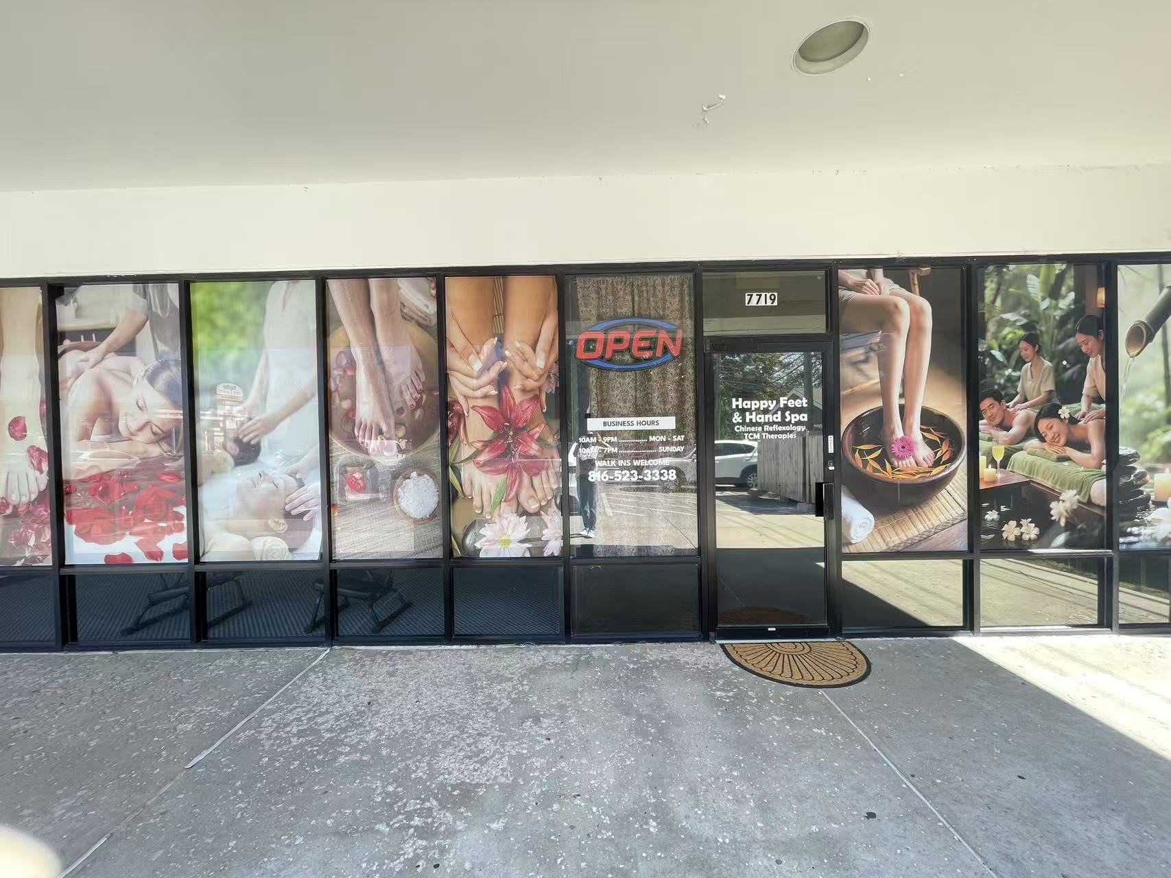 Storefront windows and entrance of Happy Feet Spa